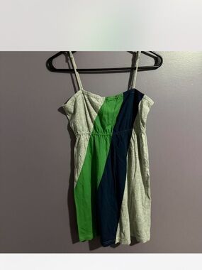 Y2K Heritage cream label with navy script and green tank
